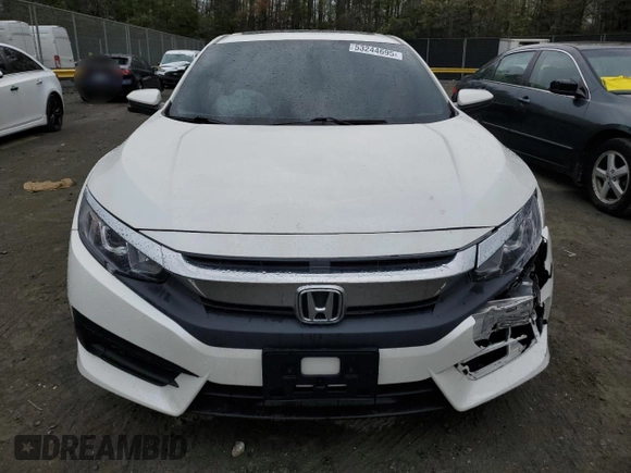 2018 Honda Civic EX с VIN 2HGFC2F72JH501729, выставлен на аукционе Copart как лот 53244695 с пробегом 123 059 миль миль и Списание • Salvage title. История ставок и продаж доступна на DreamBid. Изображение 5.