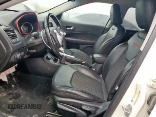 2020 Jeep Compass Trailhawk with VIN 3C4NJDDB3LT189398, listed as a Copart auction lot 59376995 with 75,674 mi miles and Salvage title. Bid and sale history available at DreamBid. Image 7.