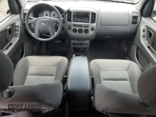 2003 Ford Escape XLT Popular 2 with VIN 1FMYU93133KD76423, listed as a Copart auction lot 57780455 with 98,779 mi miles and Salvage title. Bid and sale history available at DreamBid. Image 8.