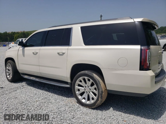 2015 GMC Yukon XL SLT with VIN 1GKS1HKC6FR167581, listed as a Copart auction lot 65600494 with 156,823 mi miles and Clean Title. Bid and sale history available at carsss.com. Image 2.