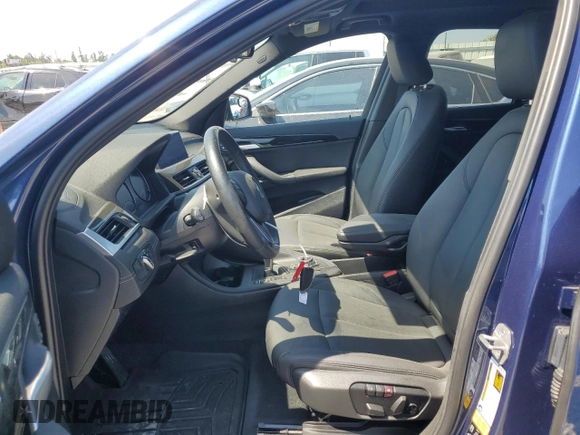 2021 BMW X1 xDrive28i with VIN WBXJG9C01M5T94314, listed as a Copart auction lot 60244134 with 43,933 mi miles and Salvage title. Bid and sale history available at DreamBid. Image 7.