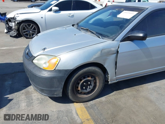 2003 Honda Civic LX with VIN 1HGEM22563L085882, listed as a IAAI auction lot 42227001 with 202,724 mi miles and . Bid and sale history available at DreamBid. Image 6.
