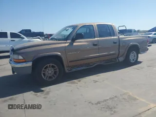 2001 Dodge Dakota Sport with VIN 1B7GL2AN31S164425, listed as a Copart auction lot 77907144 with 166,060 mi miles and Clean Title. Bid and sale history available at DreamBid. Image 1.