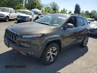 2015 Jeep Cherokee Trailhawk with VIN 1C4PJMBS8FW513391, listed as a Copart auction lot 64633115 with 115,406 mi miles and Clean title. Bid and sale history available at DreamBid. Image 1.