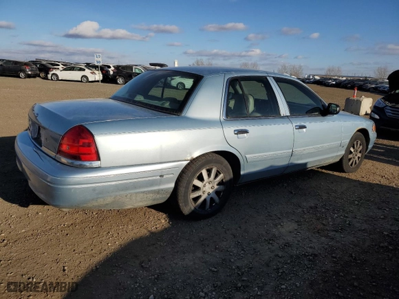 2006 Ford Crown Victoria LX with VIN 2FAFP74W96X162903, listed as a Copart auction lot 78473174 with 219,015 mi miles and Salvage Title. Bid and sale history available at carsss.com. Image 3.