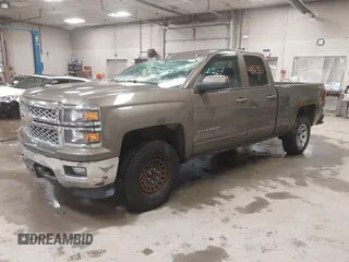 2015 Chevrolet Silverado 1500 LT with VIN 1GCVKREC6FZ183559, listed as a IAAI auction lot 41813921 with 171,304 mi miles and . Bid and sale history available at DreamBid. Image 2.