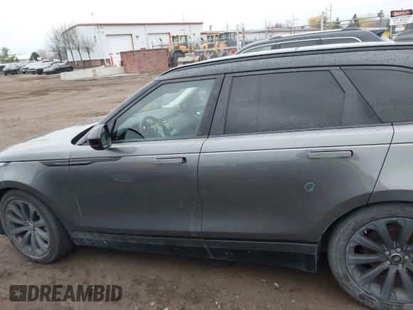2018 Land Rover Range Rover Velar S z VIN SALYB2RV6JA750501, wystawiony jako IAAI lot #40882723 z przebiegiem 77 338 mil mil oraz . Historia ofert i sprzedaży dostępna na DreamBid. Obrazek 14.