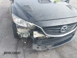 2015 Mazda 6 i Touring with VIN JM1GJ1V50F1194196, listed as a IAAI auction lot 42053615 with 173,724 mi miles. Bid and sale history available at carsss.com. Image 6.