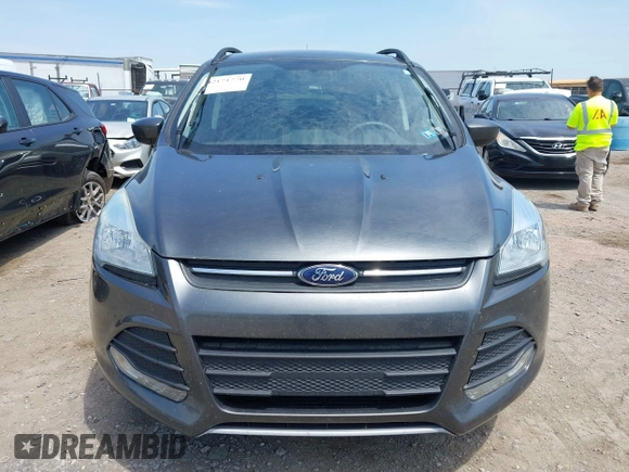 2016 Ford Escape SE with VIN 1FMCU9GX8GUB42944, listed as a IAAI auction lot 42171770 with 120,041 mi miles. Bid and sale history available at carsss.com. Image 6.