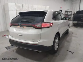 2017 Ford Edge SEL with VIN 2FMPK3J89HBC36473, listed as a IAAI auction lot 41248460 with 112,551 mi miles. Bid and sale history available at carsss.com. Image 4.