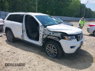 2019 Jeep Grand Cherokee Altitude with VIN 1C4RJEAGXKC737527, listed as a IAAI auction lot 42211018 with 126,689 mi miles and . Bid and sale history available at DreamBid. Image 1.
