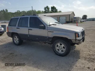 1994 Jeep Grand Cherokee Limited with VIN 1J4GZ78S1RC206288, listed as a Copart auction lot 62392685 with 207,731 mi miles and Salvage title. Bid and sale history available at DreamBid. Image 4.