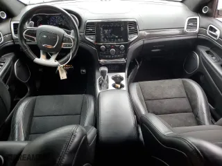2021 Jeep Grand Cherokee SRT with VIN 1C4RJFDJ1MC561144, listed as a Copart auction lot 83961214 with 49,989 mi miles and Salvage Title. Bid and sale history available at carsss.com. Image 8.