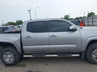 2017 Toyota Tacoma SR with VIN 5TFAX5GN6HX083614, listed as a IAAI auction lot 42314254 with 104,407 mi miles and . Bid and sale history available at DreamBid. Image 14.