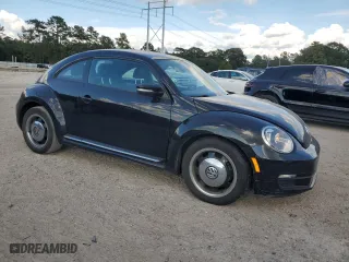 2012 Volkswagen Beetle 2.5L with VIN 3VWJX7AT9CM648002, listed as a Copart auction lot 73836554 with 84,870 mi miles and Non Repairable. Bid and sale history available at carsss.com. Image 4.