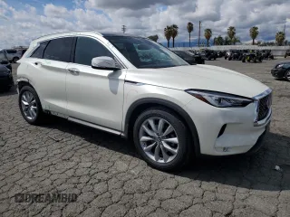2019 Infiniti QX50 LUXE with VIN 3PCAJ5M19KF133426, listed as a Copart auction lot 50993375 with 60,799 mi miles and Salvage Title. Bid and sale history available at carsss.com. Image 4.
