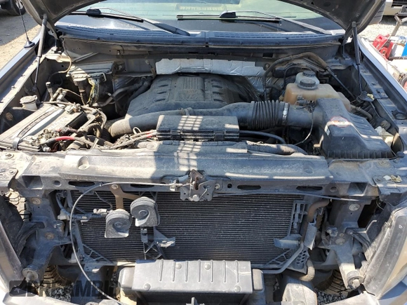 2012 Ford F-150 XL with VIN 1FTFX1ET3CFA89174, listed as a Copart auction lot 63709535 with 111,716 mi miles and Clean title. Bid and sale history available at DreamBid. Image 11.
