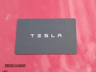 2018 Tesla Model 3 Long Range Battery z VIN 5YJ3E1EA9JF025942, wystawiony jako IAAI lot #42122703 z przebiegiem 84 453 mil mil oraz . Historia ofert i sprzedaży dostępna na DreamBid. Obrazek 11.