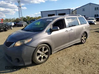 2013 Toyota Sienna SE with VIN 5TDXK3DC8DS310754, listed as a Copart auction lot 74880094 with 337,573 mi miles and Salvage title. Bid and sale history available at DreamBid. Image 1.