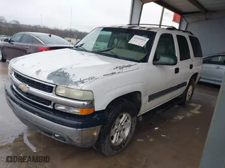 2004 Chevrolet Tahoe LT with VIN 1GNEC13ZX4J131652, listed as a IAAI auction lot 41551921 with 395,802 mi miles. Bid and sale history available at carsss.com. Image 2.