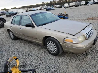 1999 Ford Crown Victoria z VIN 2FAFP73W4XX137040, wystawiony jako Copart lot #83741244 z przebiegiem 142 901 mil mil oraz Szkoda całkowita • Salvage title. Historia ofert i sprzedaży dostępna na DreamBid. Obrazek 4.
