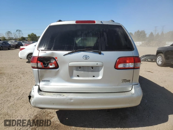 2002 Toyota Sienna LE with VIN 4T3ZF13C52U504138, listed as a Copart auction lot 74633984 with 154,406 mi miles and Salvage Title. Bid and sale history available at carsss.com. Image 6.