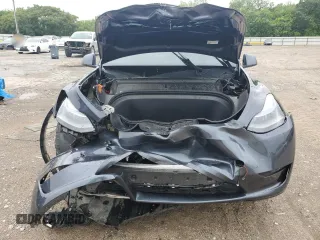 2023 Tesla Model Y Long Range z VIN 7SAYGDEE4PF752292, wystawiony jako Copart lot #53824185 z przebiegiem 61 470 mil mil oraz Szkoda całkowita • Salvage title. Historia ofert i sprzedaży dostępna na DreamBid. Obrazek 5.