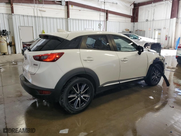 2018 Mazda CX-3 Grand Touring with VIN JM1DKFD7XJ0321776, listed as a Copart auction lot 49093765 with 94,770 mi miles and Clean Title. Bid and sale history available at carsss.com. Image 3.