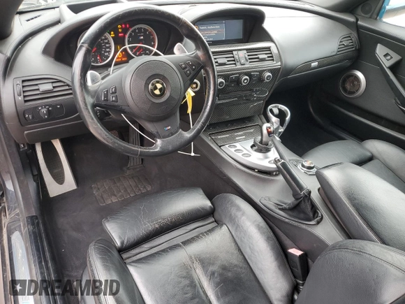 2009 BMW 6 Series M6 z VIN WBSEK935X9CY80091, wystawiony jako Copart lot #43348935 z przebiegiem 128 438 mil mil oraz Tytuł czysty. Historia ofert i sprzedaży dostępna na DreamBid. Obrazek 8.