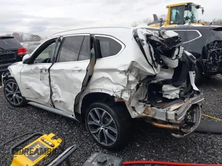 2017 BMW X1 xDrive28i with VIN WBXHT3C36H5F74818, listed as a IAAI auction lot 41853836 with 71,735 mi miles and . Bid and sale history available at DreamBid. Image 3.