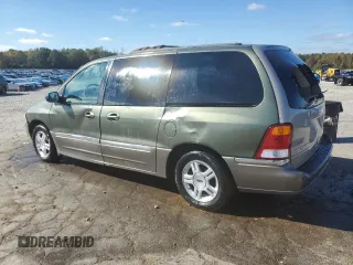 2002 Ford Windstar SEL with VIN 2FMDA53432BB05185, listed as a Copart auction lot 80389234 with 166,397 mi miles and Salvage title. Bid and sale history available at DreamBid. Image 2.