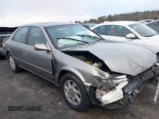 1998 Toyota Camry LE z VIN JT2BF28K7W0116628, wystawiony jako IAAI lot #41464483 z przebiegiem 236 952 mil mil oraz . Historia ofert i sprzedaży dostępna na DreamBid. Obrazek 1.