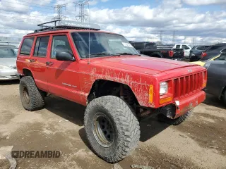 2000 Jeep Cherokee with VIN 1J4FF48S0YL113246, listed as a Copart auction lot 51861455 with 180,965 mi miles and Clean title. Bid and sale history available at DreamBid. Image 4.