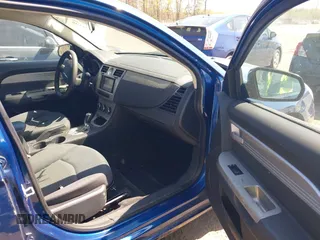 2009 Chrysler Sebring LX with VIN 1C3LC46B59N503726, listed as a IAAI auction lot 42072108 with 148,650 mi miles and . Bid and sale history available at DreamBid. Image 5.