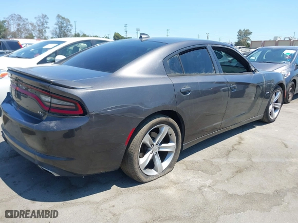 2016 Dodge Charger R/T with VIN 2C3CDXCT7GH233027, listed as a IAAI auction lot 37009912 with 132,960 mi miles. Bid and sale history available at carsss.com. Image 4.
