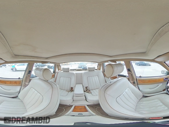 1994 Jaguar XJ with VIN SAJKX1743RC698636, listed as a Copart auction lot 56376685 with 192,928 mi miles and Salvage title. Bid and sale history available at DreamBid. Image 14.