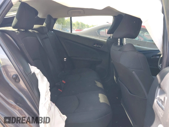 2022 Toyota Prius L Eco z VIN JTDKAMFU5N3188480, wystawiony jako IAAI lot #42146176 z przebiegiem 35 554 mil mil oraz . Historia ofert i sprzedaży dostępna na DreamBid. Obrazek 8.