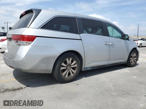 2014 Honda Odyssey EX-L with VIN 5FNRL5H64EB088080, listed as a Copart auction lot 56066845 with 238,512 mi miles and Clean Title. Bid and sale history available at DreamBid. Image 3.