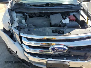 2013 Ford Edge SE z VIN 2FMDK3GCXDBB74803, wystawiony jako Copart lot #62902285 z przebiegiem 142 378 mil mil oraz Szkoda całkowita • Salvage title. Historia ofert i sprzedaży dostępna na DreamBid. Obrazek 12.