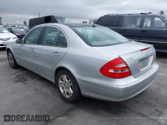 2005 Mercedes-Benz E-Class 3.2L with VIN WDBUF65J45A658795, listed as a IAAI auction lot 41923148 with 106,832 mi miles. Bid and sale history available at carsss.com. Image 3.