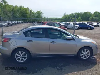 2011 Mazda Mazda3 i Touring with VIN JM1BL1VGXB1372499, listed as a IAAI auction lot 42112283 with 98,564 mi miles. Bid and sale history available at carsss.com. Image 14.