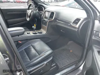2014 Jeep Grand Cherokee Overland with VIN 1C4RJFCG5EC329377, listed as a IAAI auction lot 40822324 with 106,222 mi miles. Bid and sale history available at carsss.com. Image 5.
