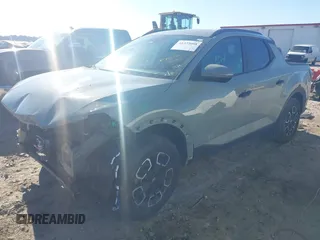 2022 Hyundai Santa Cruz SEL with VIN 5NTJCDAE2NH036992, listed as a IAAI auction lot 41335058 with 43,152 mi miles and . Bid and sale history available at DreamBid. Image 2.