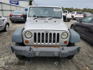 2012 Jeep Wrangler Unlimited Sport RHD with VIN 1C4BJWKG3CL220996, listed as a Copart auction lot 87860055 with 175,725 mi miles and Clean title. Bid and sale history available at DreamBid. Image 5.