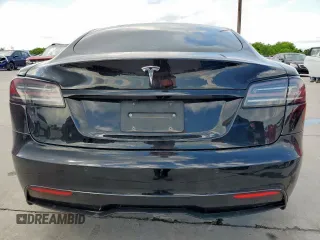 2022 Tesla Model S с VIN 5YJSA1E50NF492117, выставлен на аукционе Copart как лот 54307855 с пробегом 42 940 миль миль и Списание • Salvage title. История ставок и продаж доступна на DreamBid. Изображение 6.