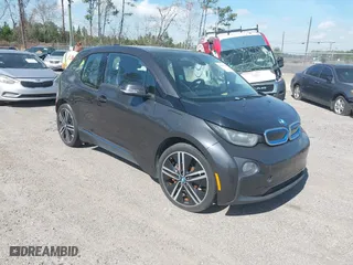 2014 BMW i3 with VIN WBY1Z4C54EV273699, listed as a IAAI auction lot 41549973 with 109,947 mi miles. Bid and sale history available at carsss.com. Image 1.