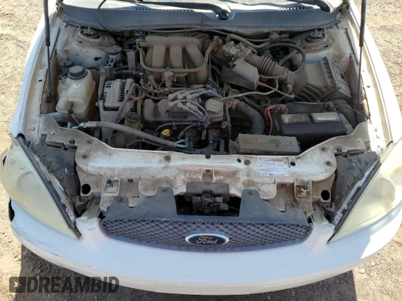 2006 Ford Taurus SE with VIN 1FAFP53UX6A194398, listed as a Copart auction lot 59582515 with 114,933 mi miles and Salvage title. Bid and sale history available at DreamBid. Image 11.