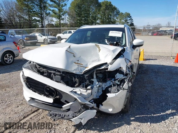 2018 Mazda CX-5 Grand Touring with VIN JM3KFADM0J0377026, listed as a IAAI auction lot 41649686 with 100,901 mi miles and . Bid and sale history available at DreamBid. Image 6.