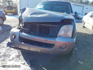 2003 Mercury Mountaineer Convenience with VIN 4M2DU66W93UJ19077, listed as a IAAI auction lot 41296559 with 164,143 mi miles. Bid and sale history available at carsss.com. Image 6.