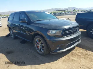 2014 Dodge Durango R/T z VIN 1C4SDHCT5EC466885, wystawiony jako IAAI lot #42074576 z przebiegiem 203 893 mil mil oraz . Historia ofert i sprzedaży dostępna na DreamBid. Obrazek 1.